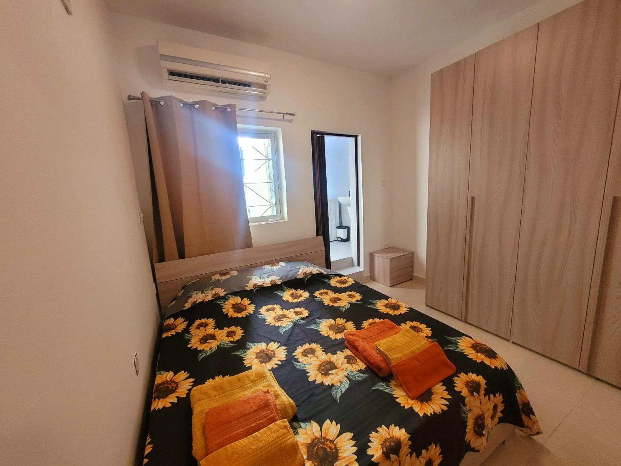 Sunflower Maltese House In *